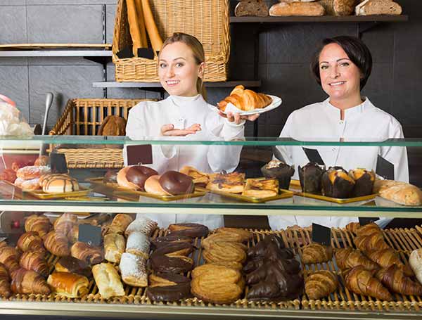 Small Business Pastry Shop Entrepreneurs Demonstrate Quality Store Product Merchandise Through Website Online Video Marketing Promotions