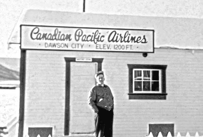Man Stands In Snow Outside Door Of Canadian Pacific Airlines Dawson City Yukon Office 1949 Vintage