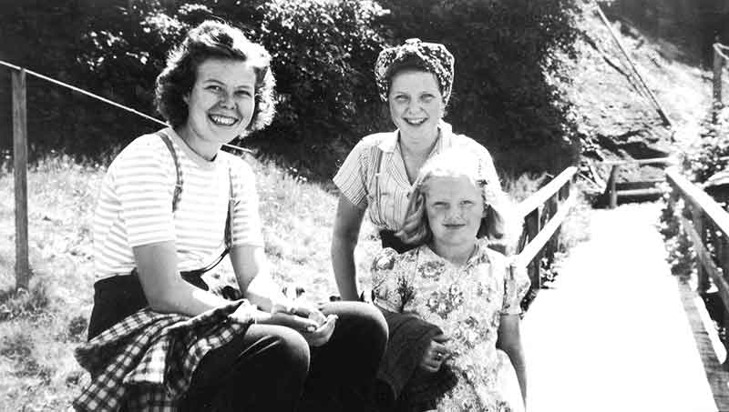 3 Young Females Sitting On Wood Walkway At Good Hope Cannery Rivers Inlet British Columbia 1942